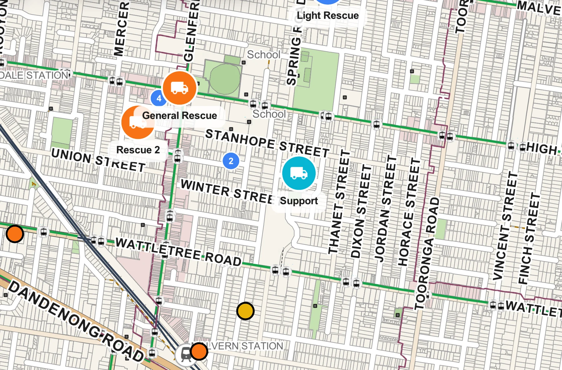 Four vehicles on the map near the station, each in the colour of its status, with incidents around them